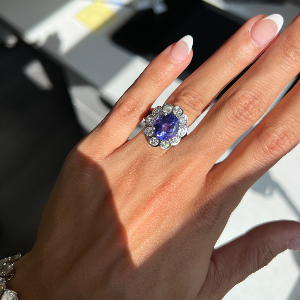 18kt White Gold Tanzanite Flower Diamond Halo Ring