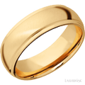 7 mm wide Domed Stepped Down Edges 14K Yellow Gold band.