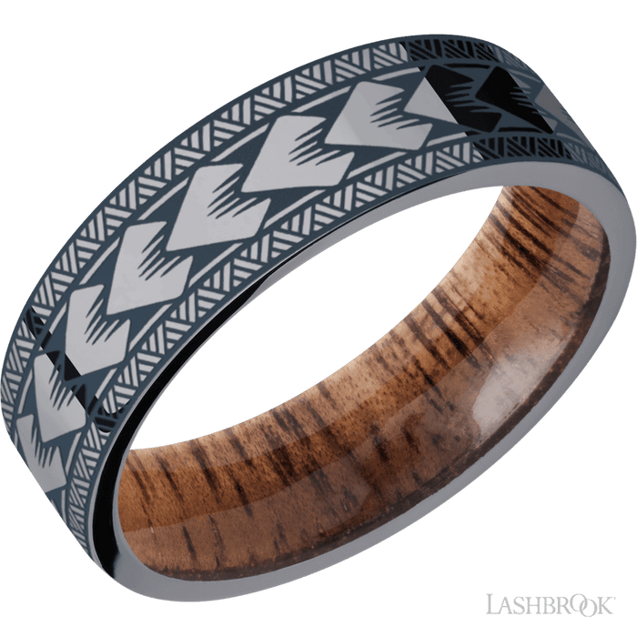 7 mm wide/Flat/Tantalum band with a laser carved Maori pattern also featuring a Koa sleeve.