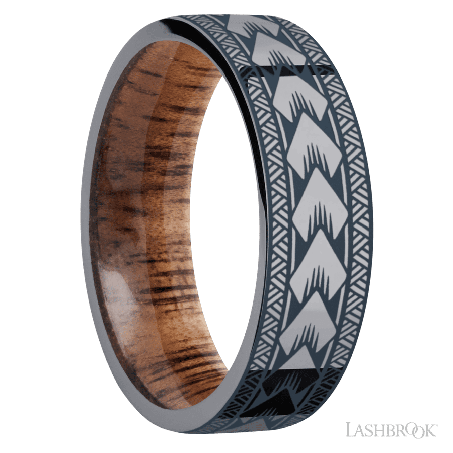 7 mm wide/Flat/Tantalum band with a laser carved Maori pattern also featuring a Koa sleeve.
