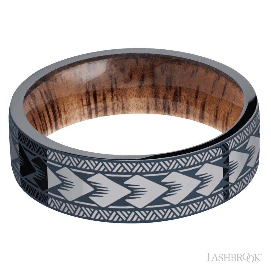 7 mm wide/Flat/Tantalum band with a laser carved Maori pattern also featuring a Koa sleeve.