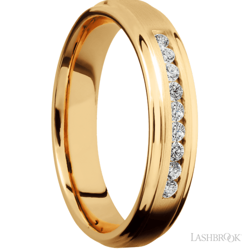 "5 mm wide/Flat Grooved Edges/14K Yellow Gold band with an  arrangement of 9, .03 carat Round Diamond stones in a Channel setting."