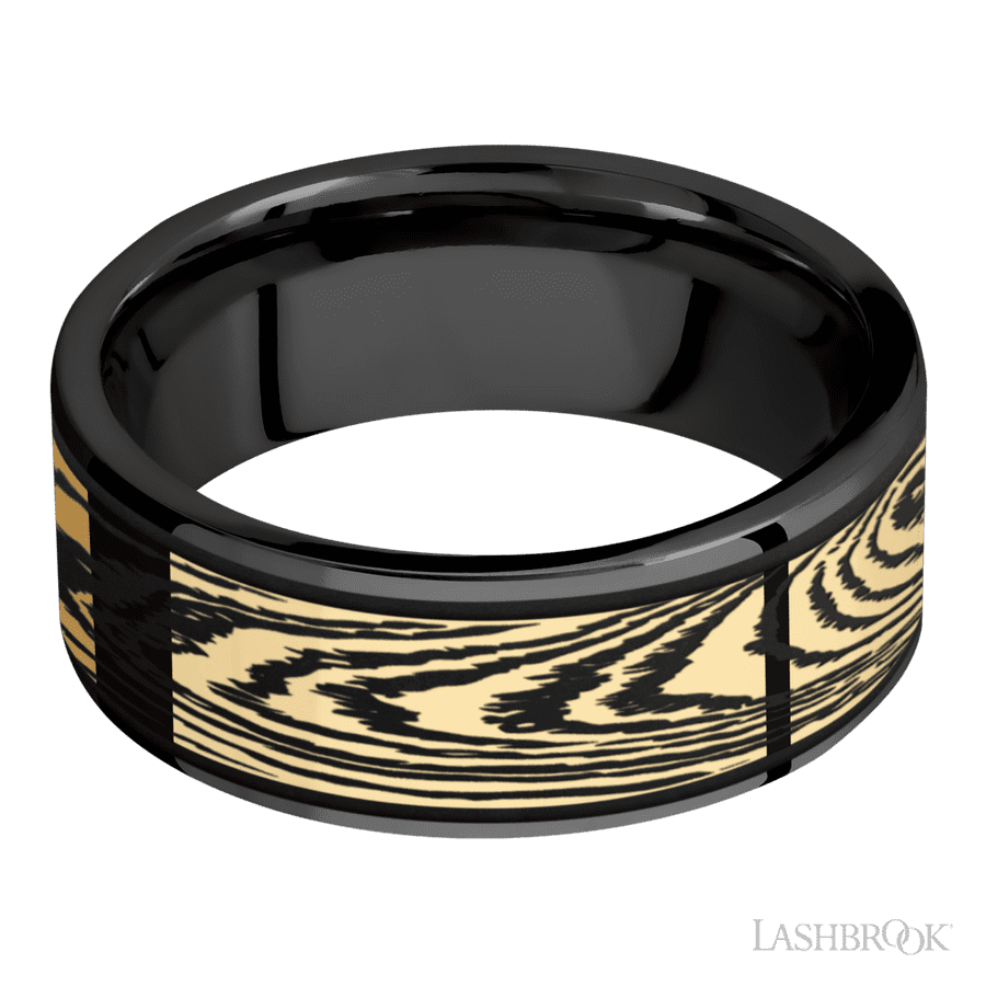 8 mm wide/Flat/Zirconium band with one 6 mm Centered inlay of 14K Yellow Gold with a laser carved Woodgrain pattern.