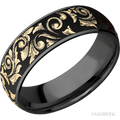 7 mm wide/Domed/Zirconium band with one 6 mm Centered inlay of 14K Yellow Gold with a laser carved Western Scroll pattern.