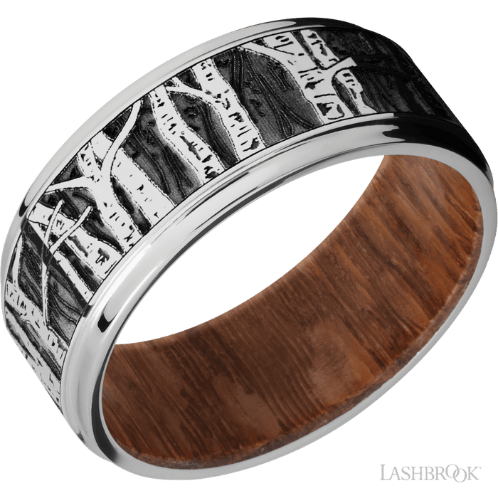 9 mm wide/Flat Grooved Edges/Cobalt Chrome band with a laser carved Aspen pattern also featuring a Leopard Wood sleeve.