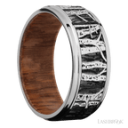 9 mm wide/Flat Grooved Edges/Cobalt Chrome band with a laser carved Aspen pattern also featuring a Leopard Wood sleeve.