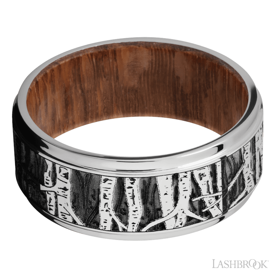 9 mm wide/Flat Grooved Edges/Cobalt Chrome band with a laser carved Aspen pattern also featuring a Leopard Wood sleeve.