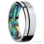 7 mm wide/Flat/14K White Gold band with one 0.5 mm Off Center inlay of Black also featuring a Abalone sleeve.