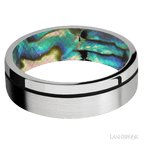 7 mm wide/Flat/14K White Gold band with one 0.5 mm Off Center inlay of Black also featuring a Abalone sleeve.