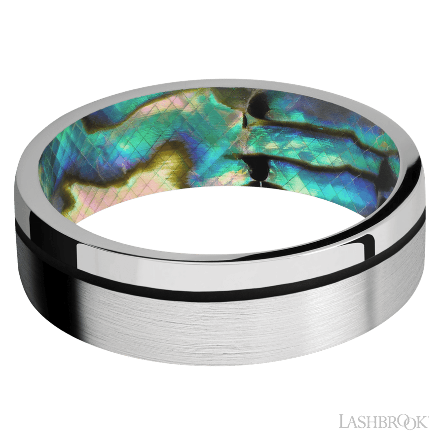 7 mm wide/Flat/14K White Gold band with one 0.5 mm Off Center inlay of Black also featuring a Abalone sleeve.