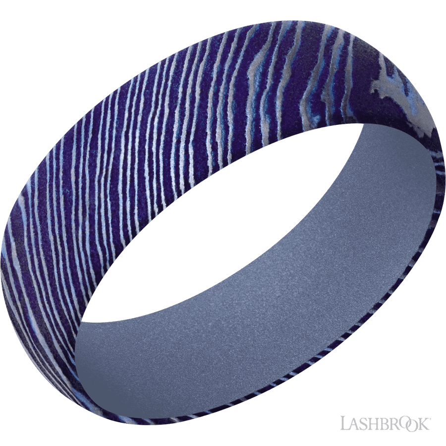 7 mm wide Domed Titanium Damascus band featuring a Crushed Orchid sleeve.