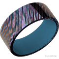 9 mm wide Flat Titanium Damascus band featuring a Royal Blue sleeve.