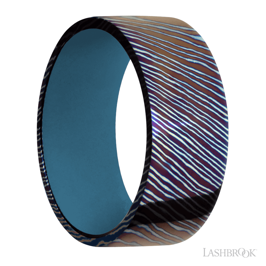 9 mm wide Flat Titanium Damascus band featuring a Royal Blue sleeve.