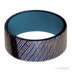 9 mm wide Flat Titanium Damascus band featuring a Royal Blue sleeve.