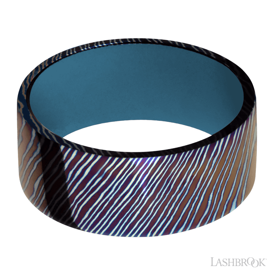 9 mm wide Flat Titanium Damascus band featuring a Royal Blue sleeve.
