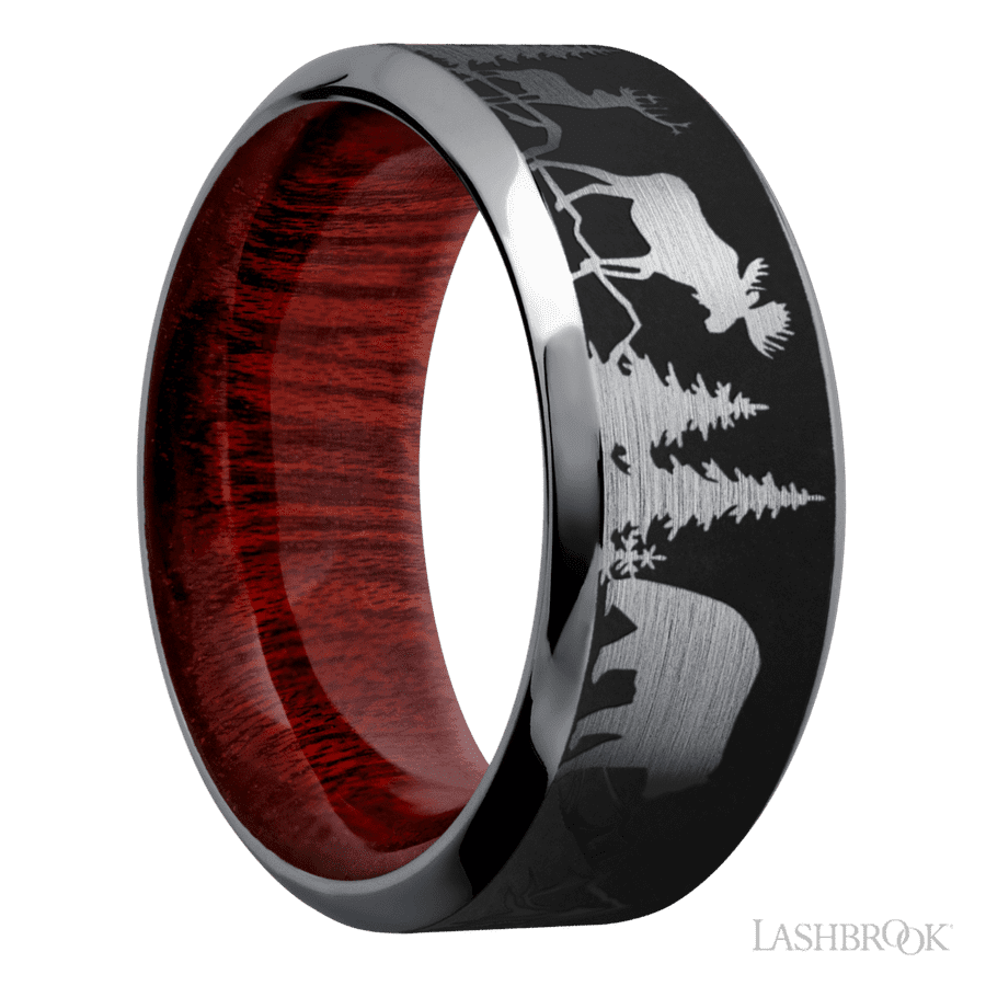 9 mm wide/High Bevel/Tantalum band with a laser carved Bear Moose Deer Mountain pattern also featuring a Blood Wood sleeve.