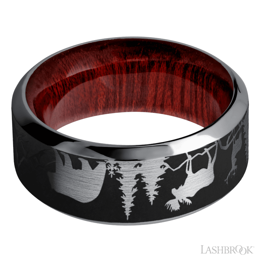 9 mm wide/High Bevel/Tantalum band with a laser carved Bear Moose Deer Mountain pattern also featuring a Blood Wood sleeve.