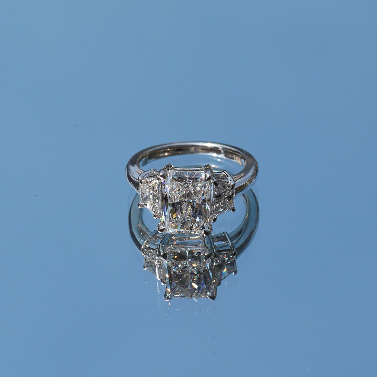 Lab-Grown Radiant Three-Stone Engagement Ring with Trapezoids