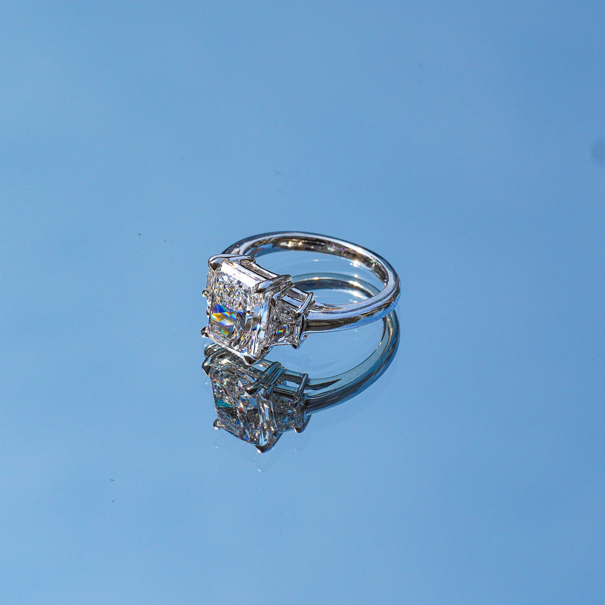 Lab-Grown Radiant Three-Stone Engagement Ring with Trapezoids