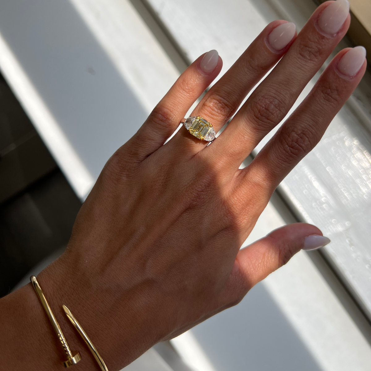 Three-Stone Emerald-Cut Diamond Ring With Half Moon Sides, Platinum & 18K Gold