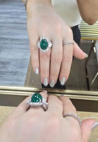 Emerald Halo Leaf Motif Ring