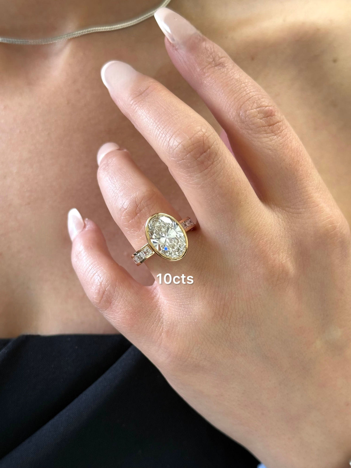 Lab-Grown Bezel Oval Diamond Ring with Channel-Set Emerald Accents