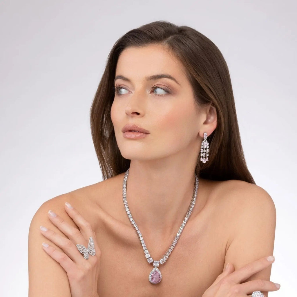 Red Carpet Worthy Chandelier Earrings by Kathy Hilton in Emerald