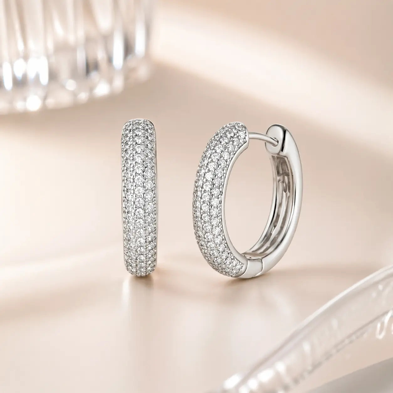 Sexy Pave Huggies by Thalia In Platinum
