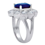 18kt White Gold Tanzanite Flower Diamond Halo Ring