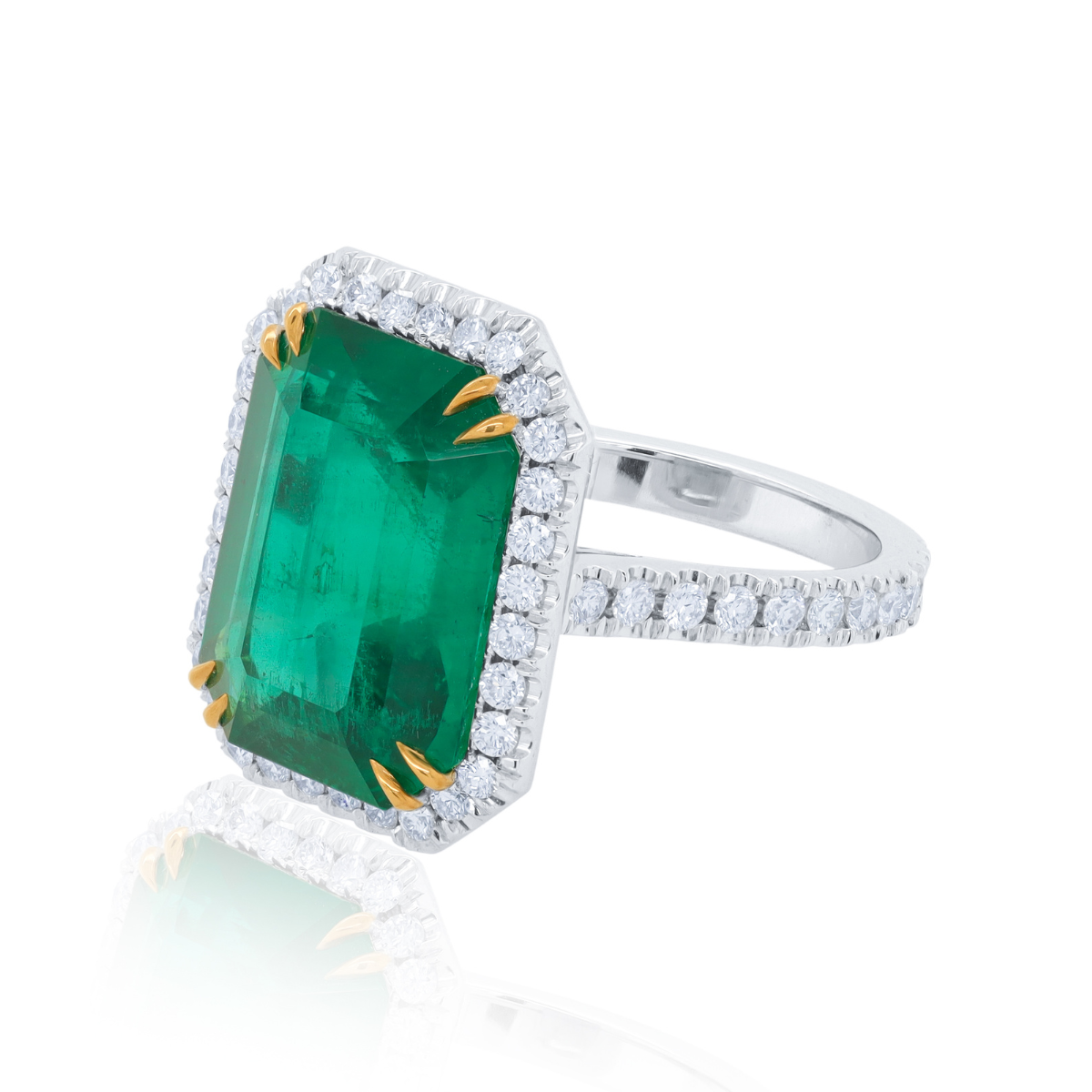 Platinum and 18kt Yellow Gold Emerald Diamond Halo Ring