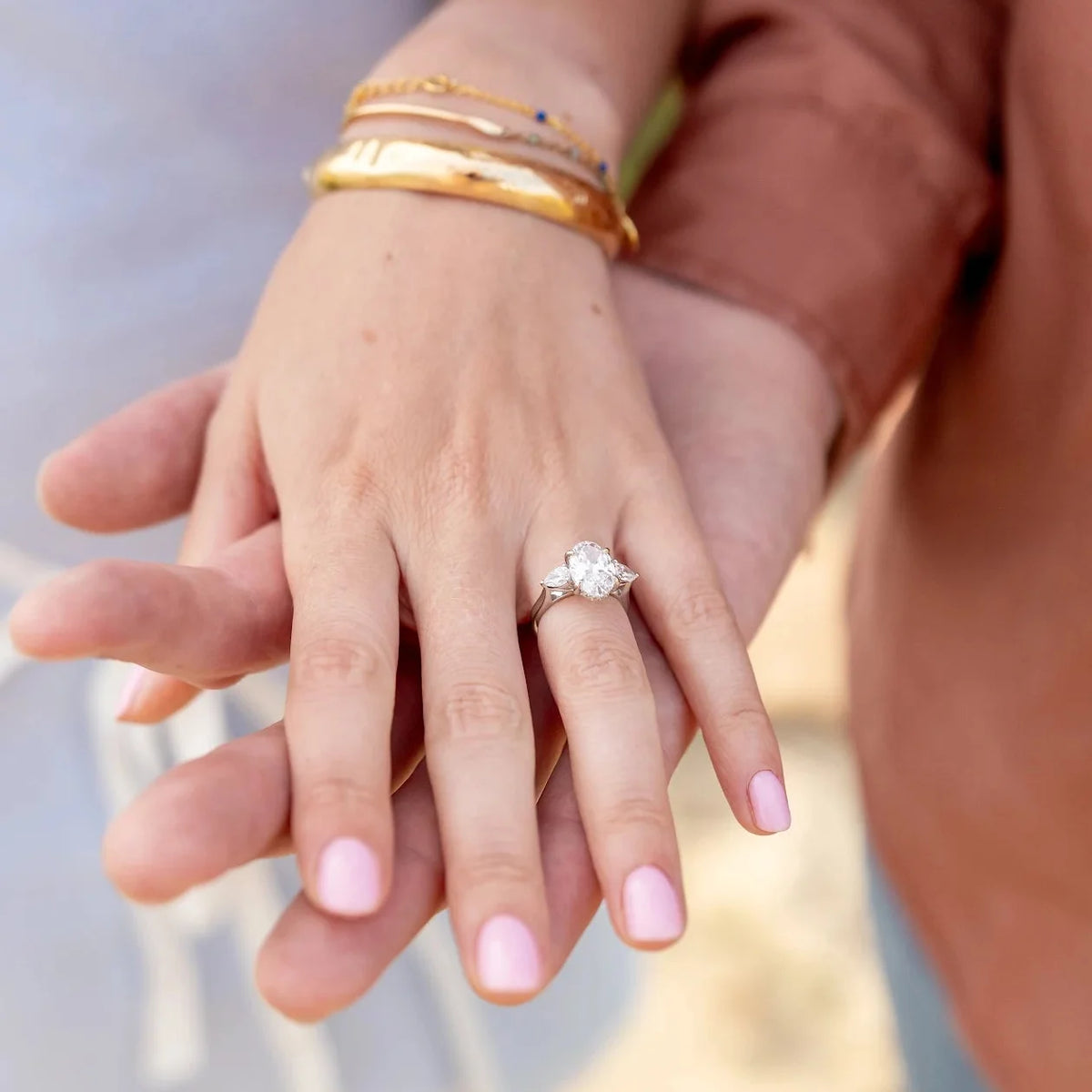 Lab-Grown Oval and Pear Three-Stone Engagement Ring